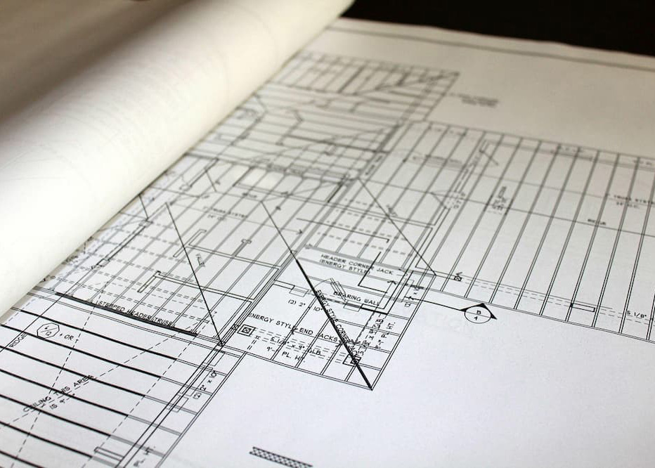 Custom home construction documents showing detailed residential wall and framing plans